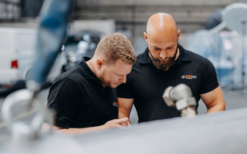 Promix employees during quality inspection of a fiber cooler